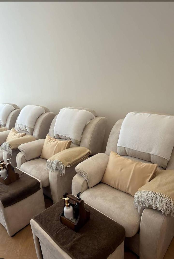 Row of reclining massage chairs